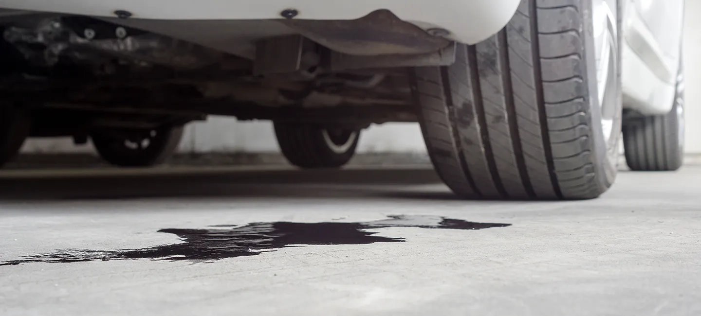 Oil leak under vehicle in The Woodlands, TX.